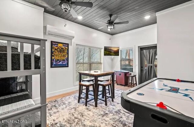 rec room featuring ceiling fan, a wall mounted air conditioner, crown molding, wood ceiling, and light hardwood / wood-style flooring