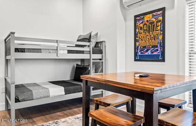 bedroom with wood-type flooring