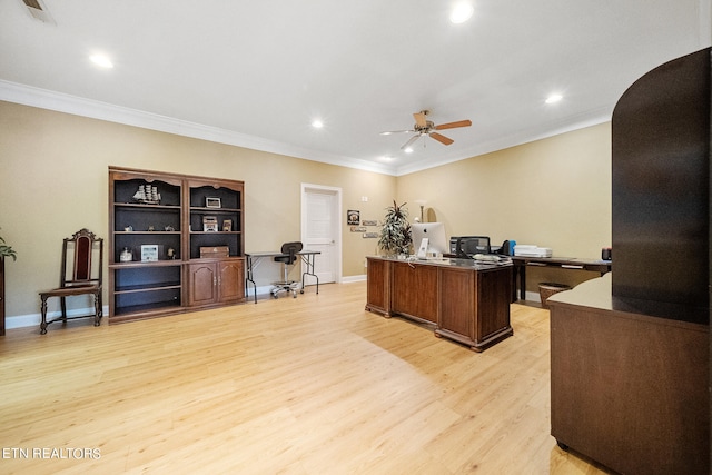 office area with ceiling fan, crown molding, and light wood-type flooring