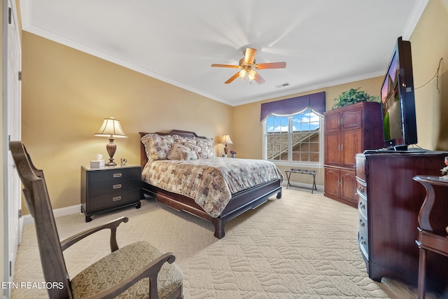 bedroom featuring ceiling fan, light carpet, and crown molding