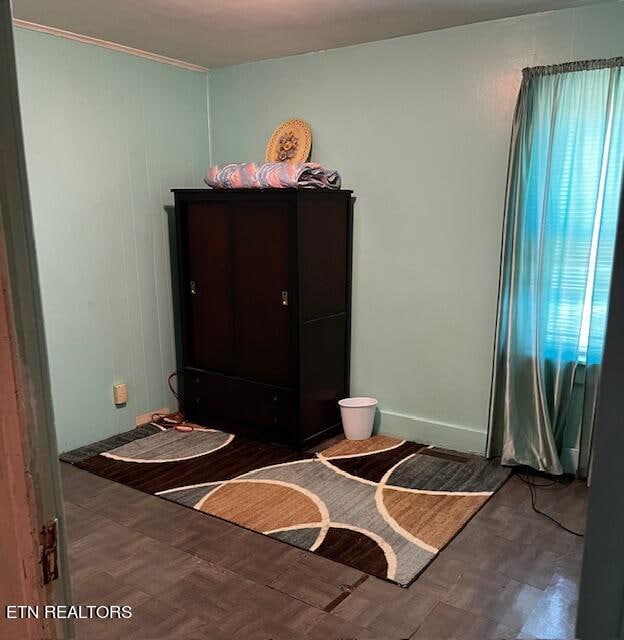 miscellaneous room featuring parquet floors