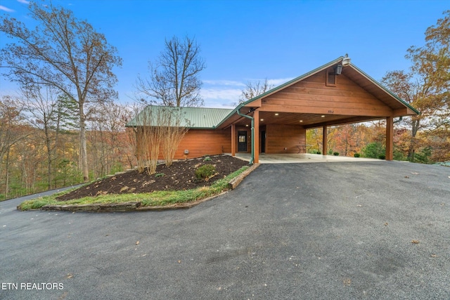 view of front of house with a carport