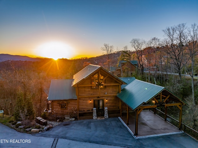 view of log cabin