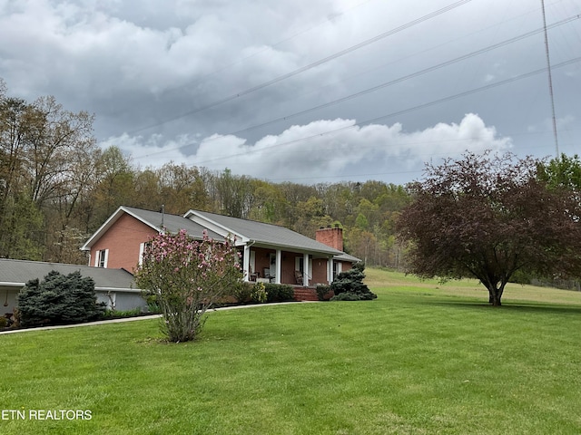 single story home with a front yard