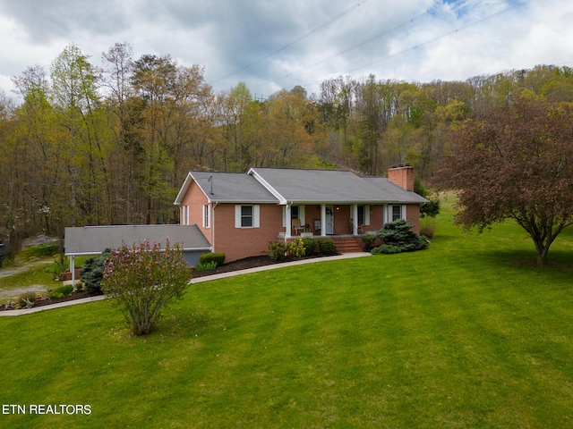 view of front of house featuring a porch and a front lawn