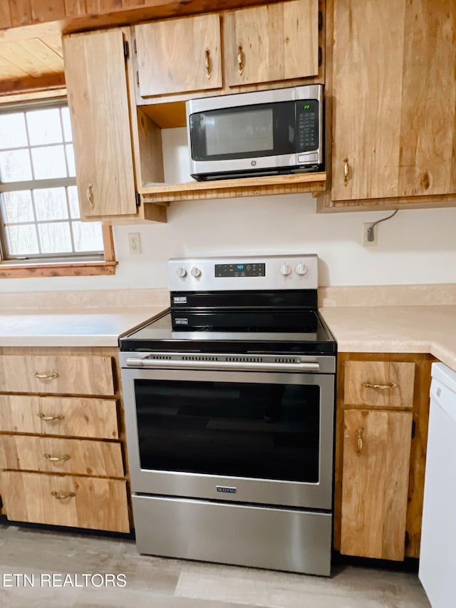 kitchen with appliances with stainless steel finishes