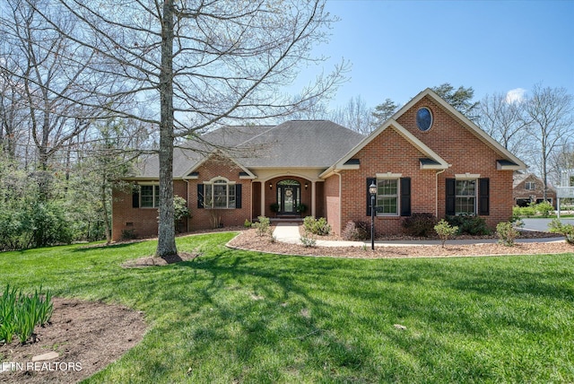 ranch-style house with a front lawn