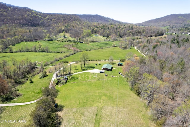 aerial view with a mountain view and a rural view