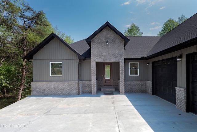 view of front of home with a garage