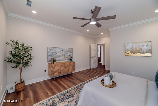 bedroom with ornamental molding, ceiling fan, and dark hardwood / wood-style flooring