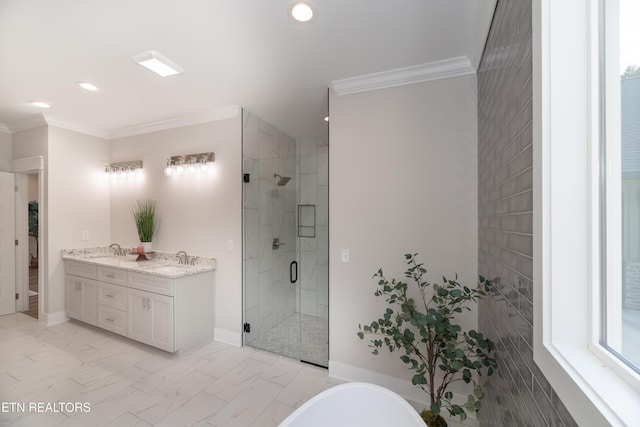 bathroom featuring ornamental molding, separate shower and tub, and vanity