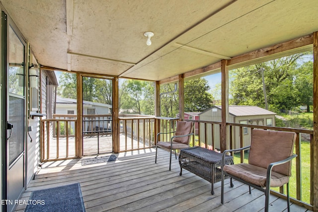 wooden deck with a storage unit