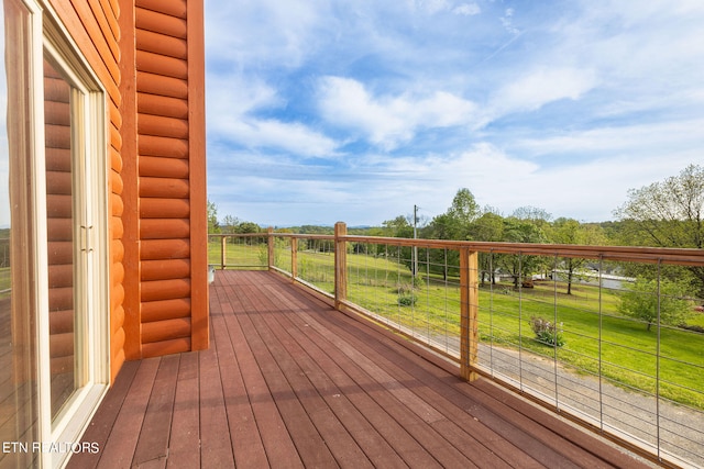 deck featuring a yard