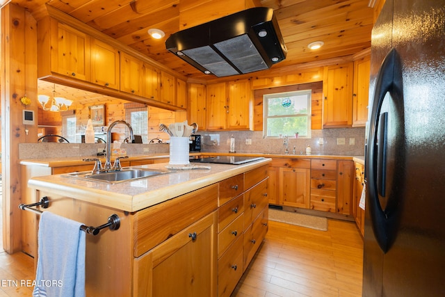 kitchen with exhaust hood, sink, light hardwood / wood-style floors, wood ceiling, and black appliances