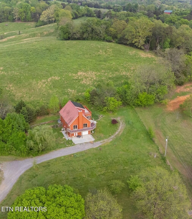 birds eye view of property featuring a rural view