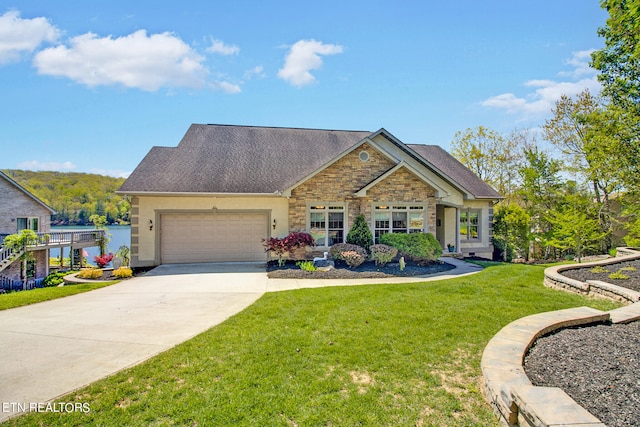 craftsman house with a front lawn and a garage