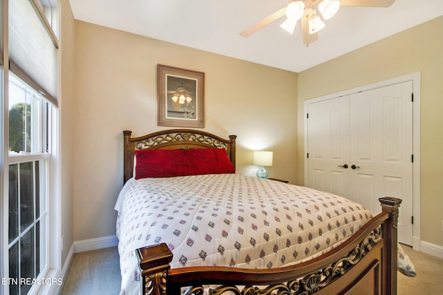 bedroom with a closet, carpet floors, and ceiling fan