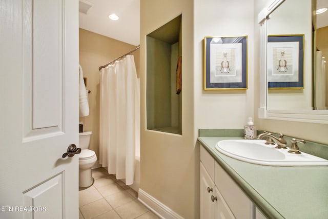 full bathroom featuring tile floors, oversized vanity, toilet, and shower / tub combo with curtain