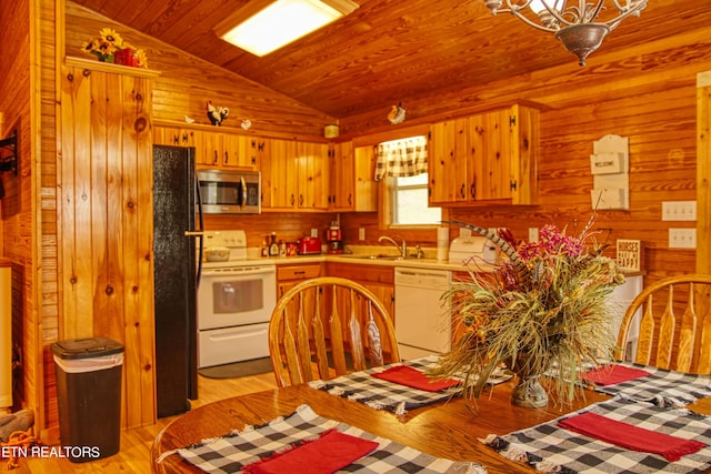 kitchen featuring sink, white appliances, light wood-type flooring, wood ceiling, and lofted ceiling