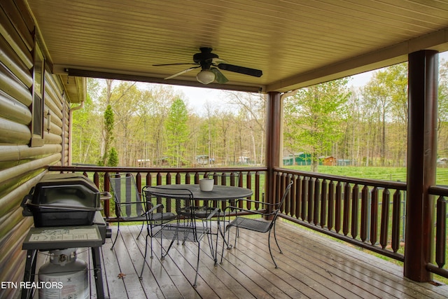 wooden terrace with ceiling fan