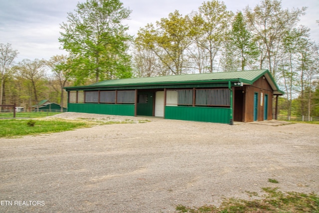 view of stable with an outdoor structure