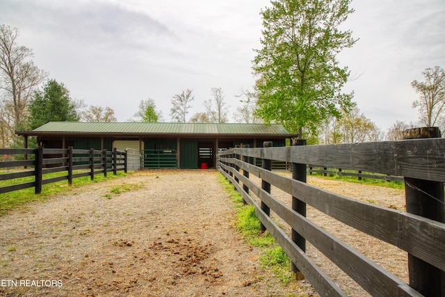 view of stable featuring an outdoor structure