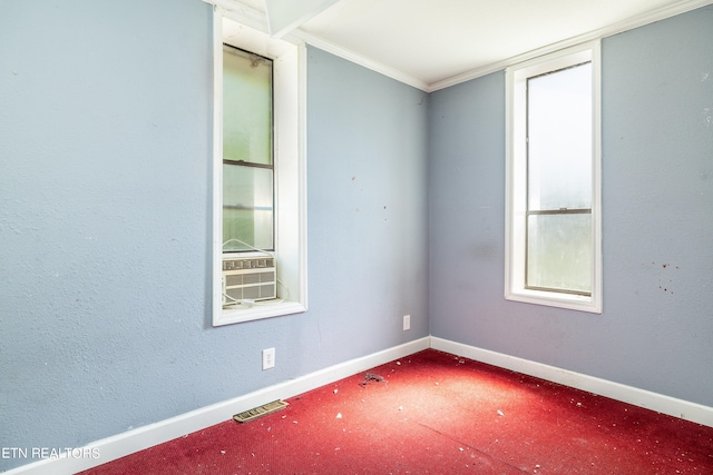 unfurnished room featuring ornamental molding