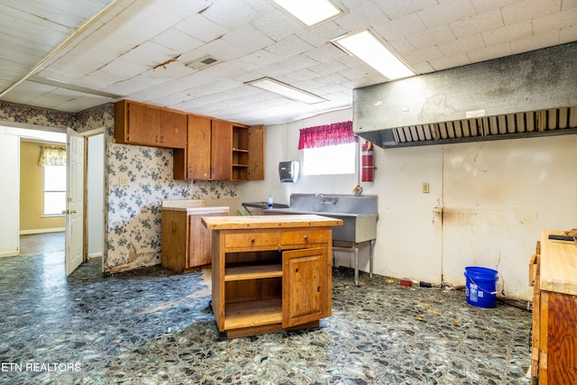 kitchen featuring dark tile floors