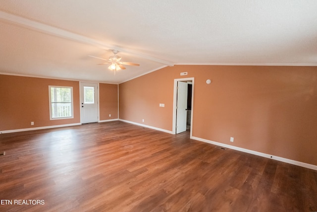 spare room featuring ornamental molding, wood-type flooring, ceiling fan, and vaulted ceiling