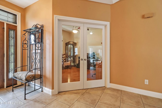 57 Inwood Ter, Crossville, TN 38558 - foyer entrance featuring light tile patterned flooring, baseboards, and french doors