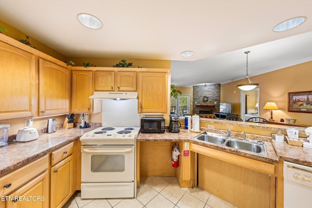 kitchen with light tile floors, pendant lighting, white appliances, and sink