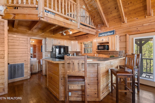 kitchen with wood ceiling, wooden walls, black appliances, and dark wood-type flooring