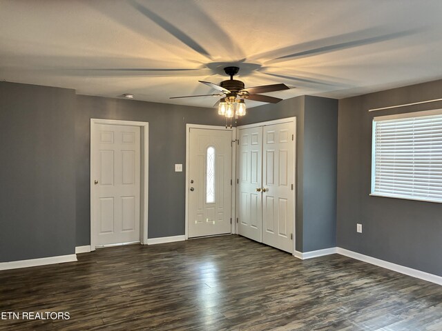 foyer featuring ceiling fan and dark hardwood / wood-style flooring