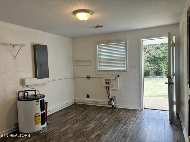 interior space with hookup for an electric dryer, hookup for a washing machine, dark wood-type flooring, water heater, and electric panel