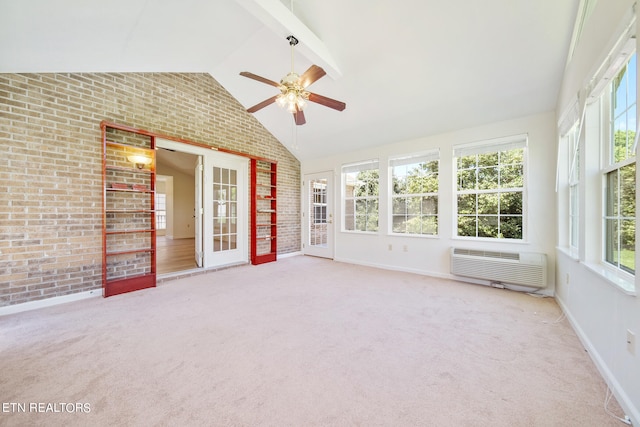 unfurnished sunroom with lofted ceiling with beams and ceiling fan