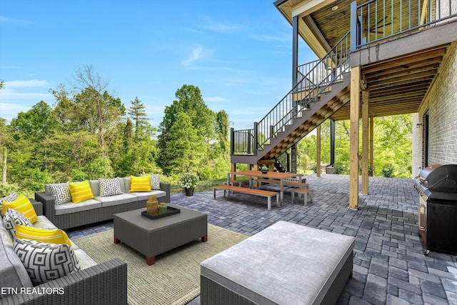 view of patio featuring an outdoor hangout area and grilling area