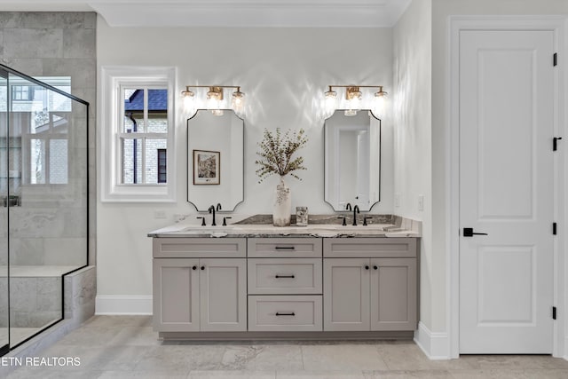 bathroom featuring an enclosed shower and vanity