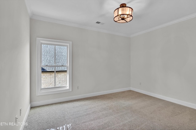 unfurnished room featuring crown molding and light colored carpet