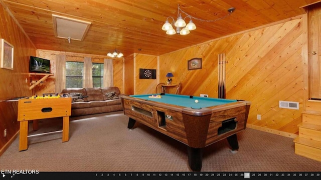 playroom with wood walls, wooden ceiling, and carpet floors