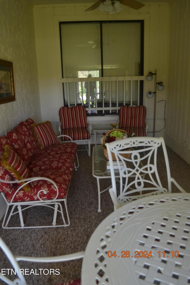 interior space featuring ceiling fan