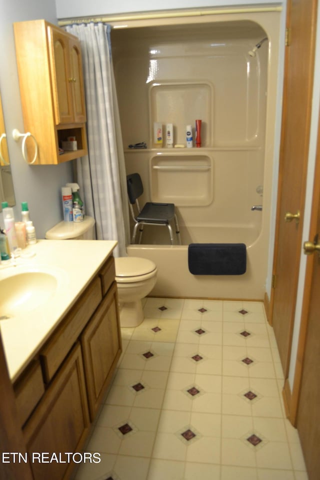 full bathroom with toilet, vanity, shower / bath combination with curtain, and tile floors