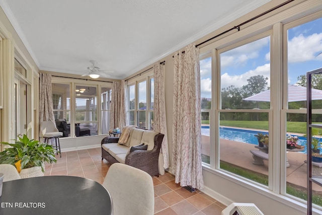 sunroom / solarium with ceiling fan