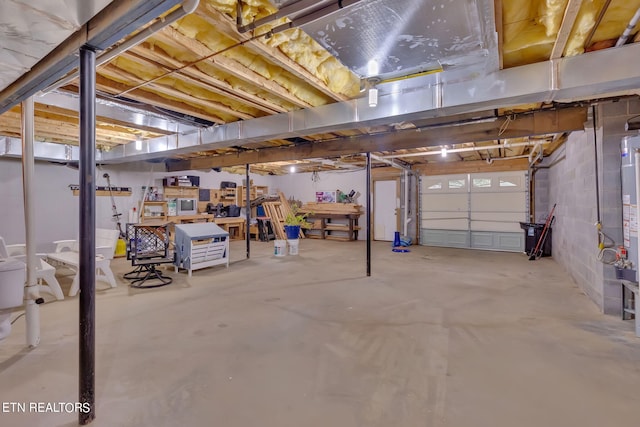 garage featuring gas water heater