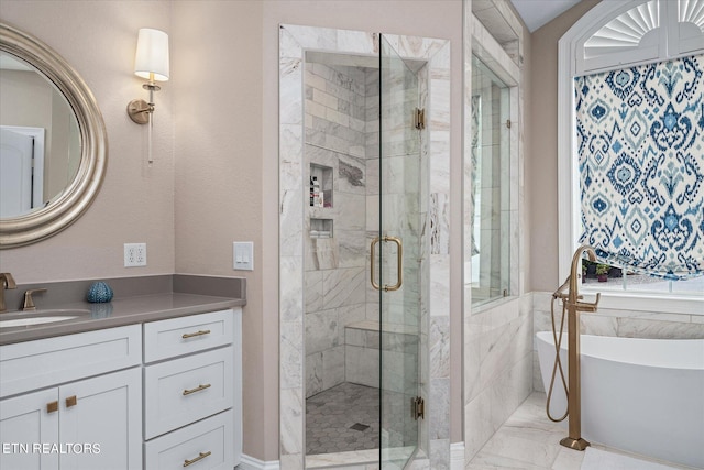 bathroom featuring vanity and independent shower and bath