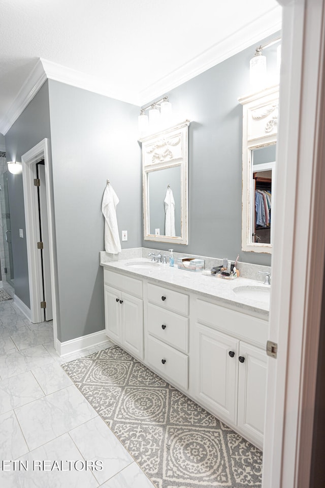 bathroom featuring vanity and ornamental molding