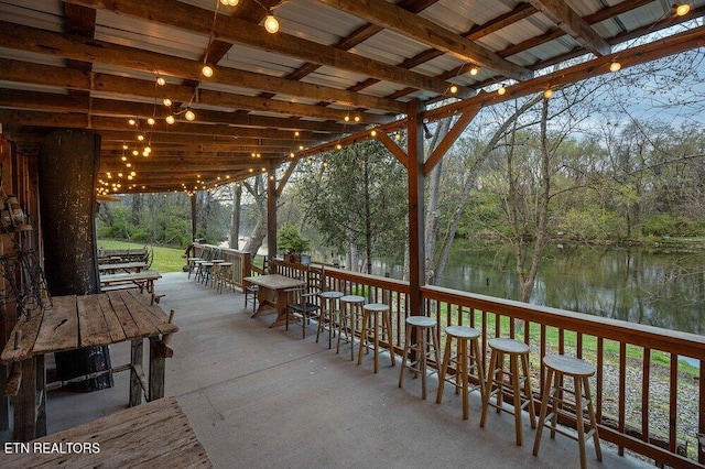 view of patio featuring a water view