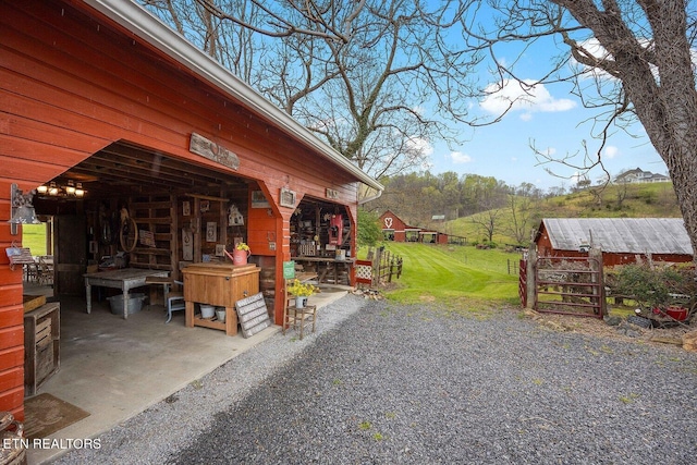 exterior space featuring an outbuilding
