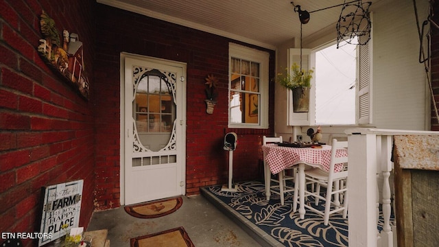 doorway to property with a porch