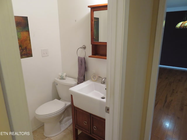 half bath with toilet and vanity