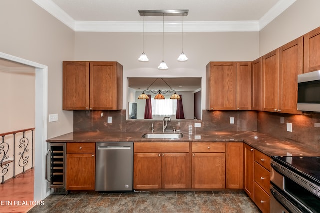 kitchen with appliances with stainless steel finishes, wine cooler, brown cabinets, and a sink